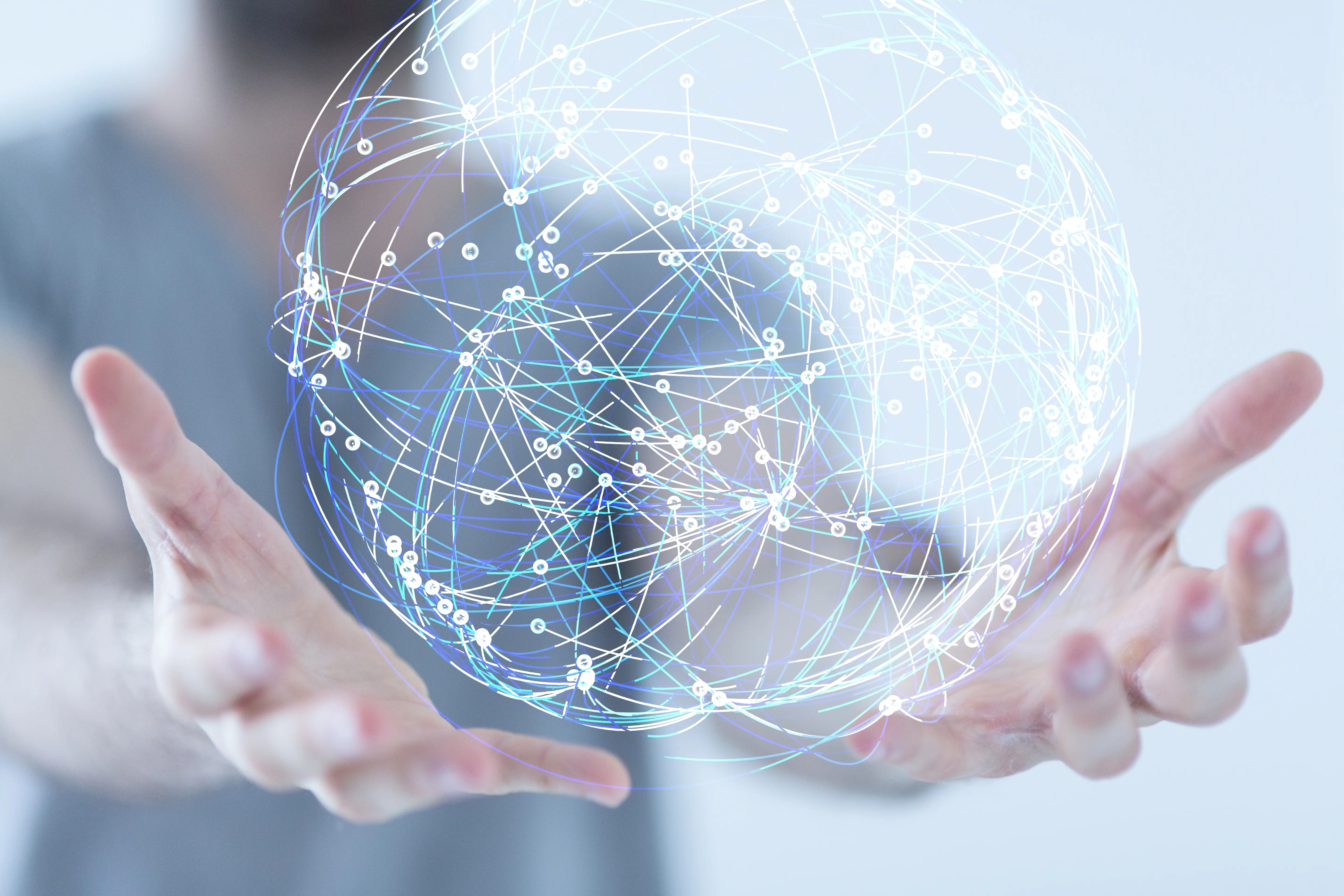 An image of a man with a globe inside his hands